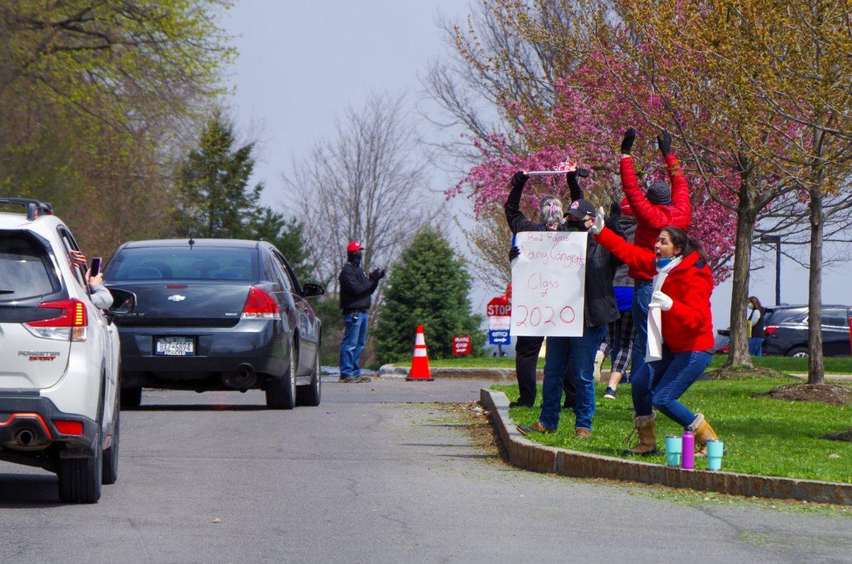 J-DHS Staff Celebrates Seniors with Lawn Sign Distribution Ceremony