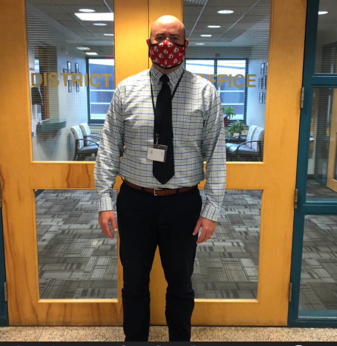 Assistant Superintendent Nate Franz shows off his JD face mask.  Photo by the author.