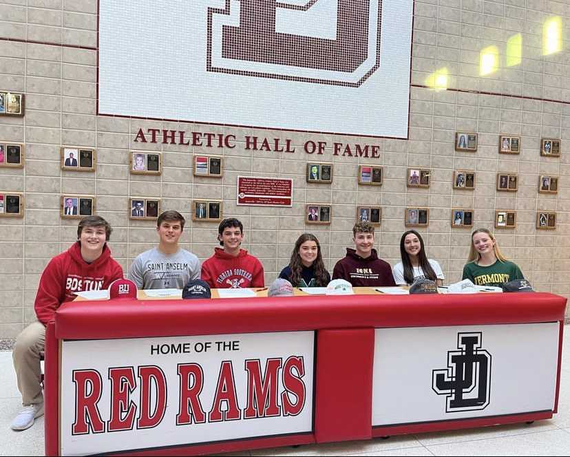 Photo shows the 7 seniors that signed their Letters of Intent. Photo Credit: The Flock