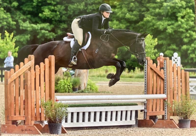 Weldum and her horse, Sam, compete in Low Children's Hunters in Saratoga over the summer. Image Credit: Adrianne Weldum, ('23)