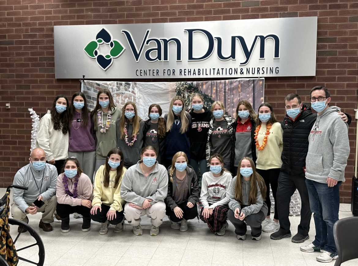 Photo shows members of the girls soccer and softball teams at Van Duyn. Photo Credit: Theresa Bulone