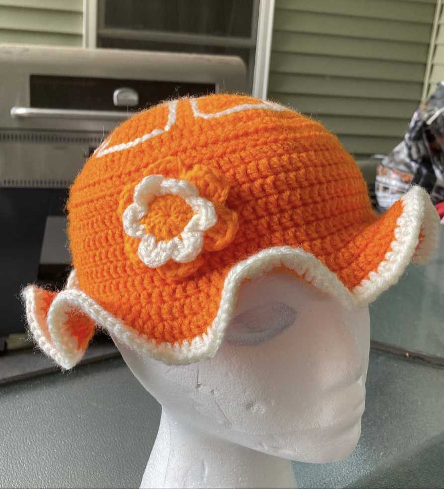 Photo shows crochet hat on a mannequin head. Photo Credit: Lyla Rivard Instagram: lylas_version.