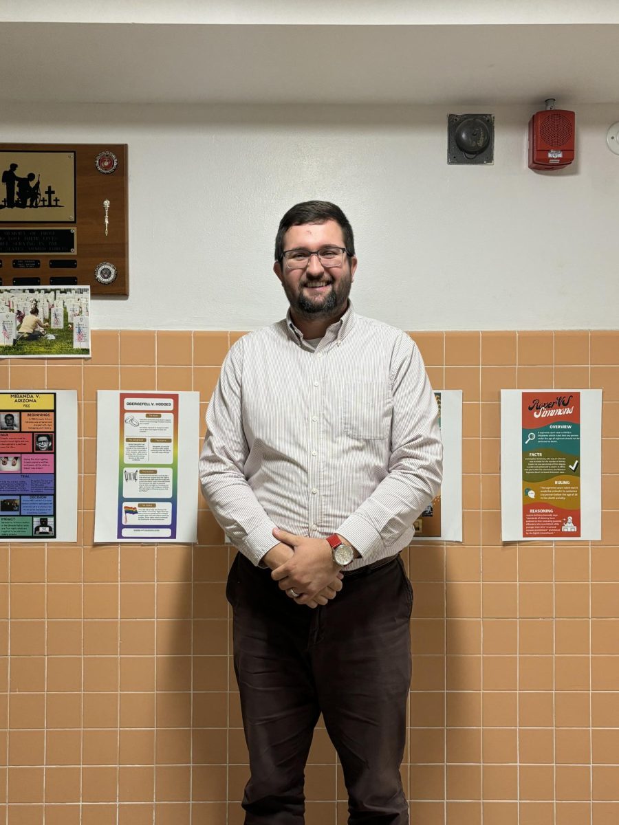 Photo shows Mr. Yanchuk standing in the blue hall. Photo courtesy of Nicole Chen, '26