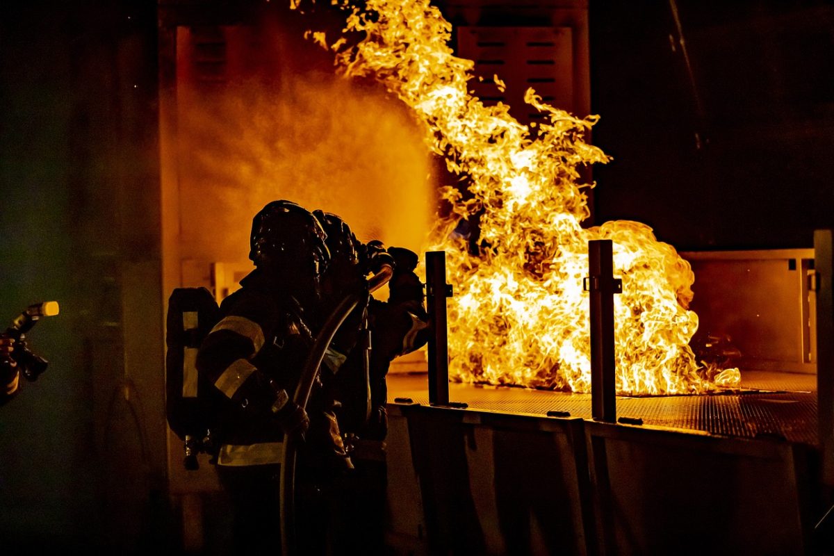 Image shows firefighter fighting against a fire. Image courtesy of fish96 on Pixabay