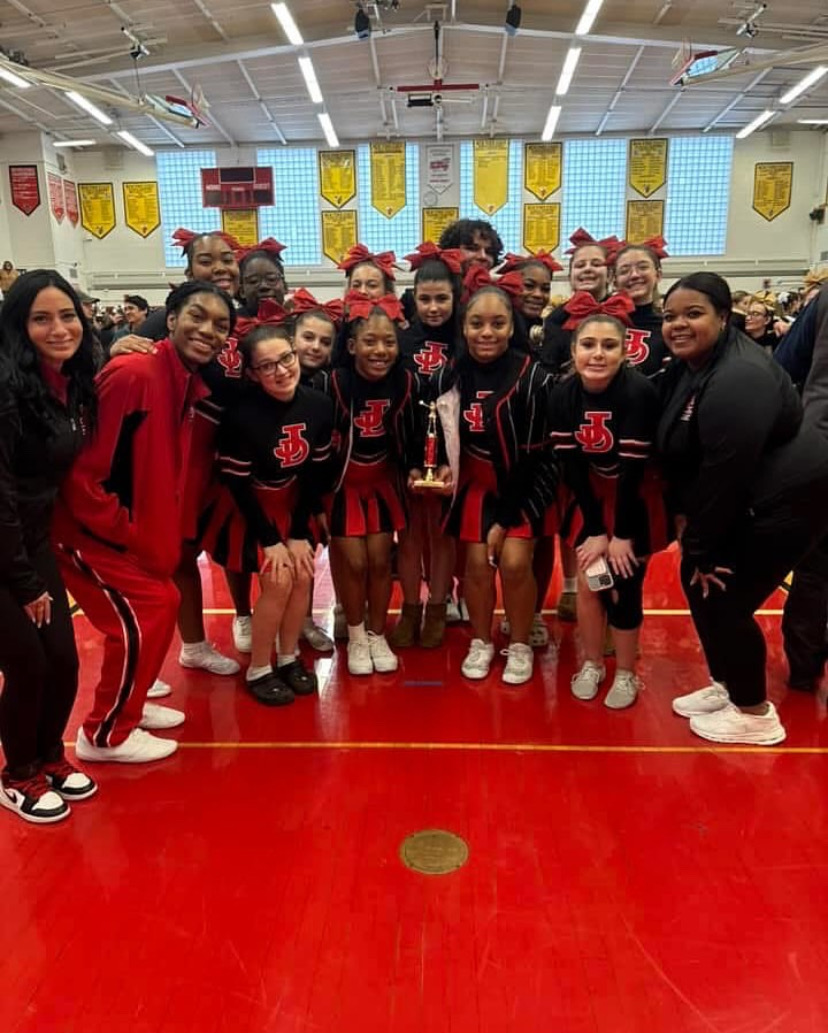 Photo shows cheer team. Photo courtesy of Mykaila Ricks, '26