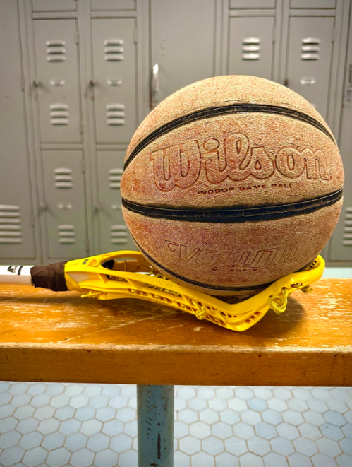 Photo shows basketball sitting on top of lacrosse stick. Photo courtesy of Lucia Brown, '28 and Kara Barnello, '28