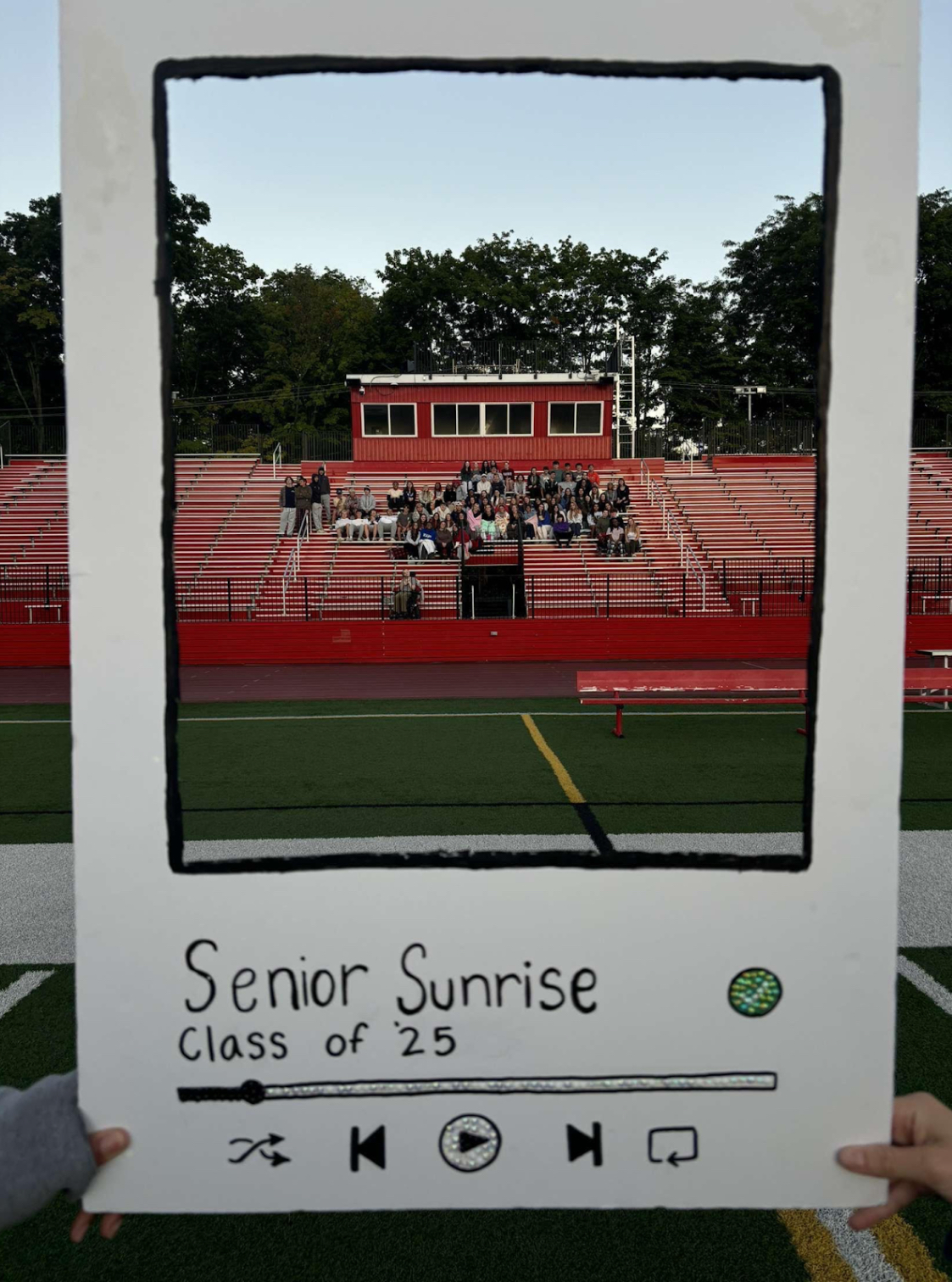 Photo shows seniors in a card cutout. Photo courtesy of Ava Sandroni, '25