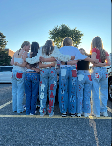 Photograph shows seniors with their painted jeans.
